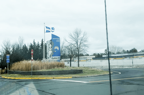 welcome to Quebec flag and sign