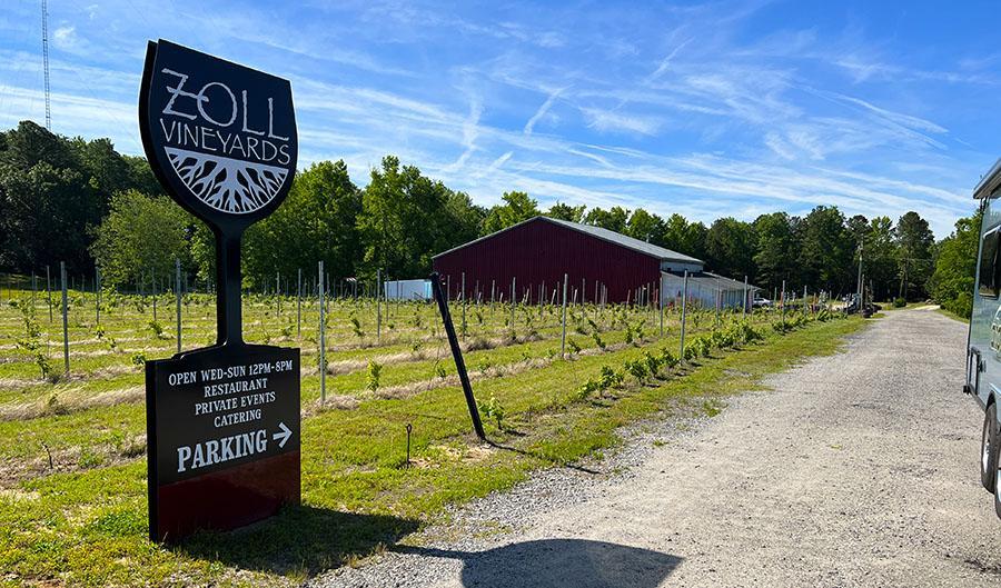 Exterior of Zoll Vineyards showing the winery and sign.